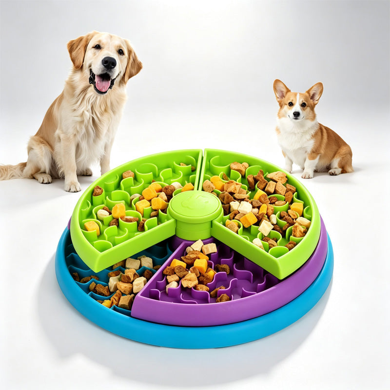 Two dogs next to the 3-in-1 rotating puzzle feeder filled with food