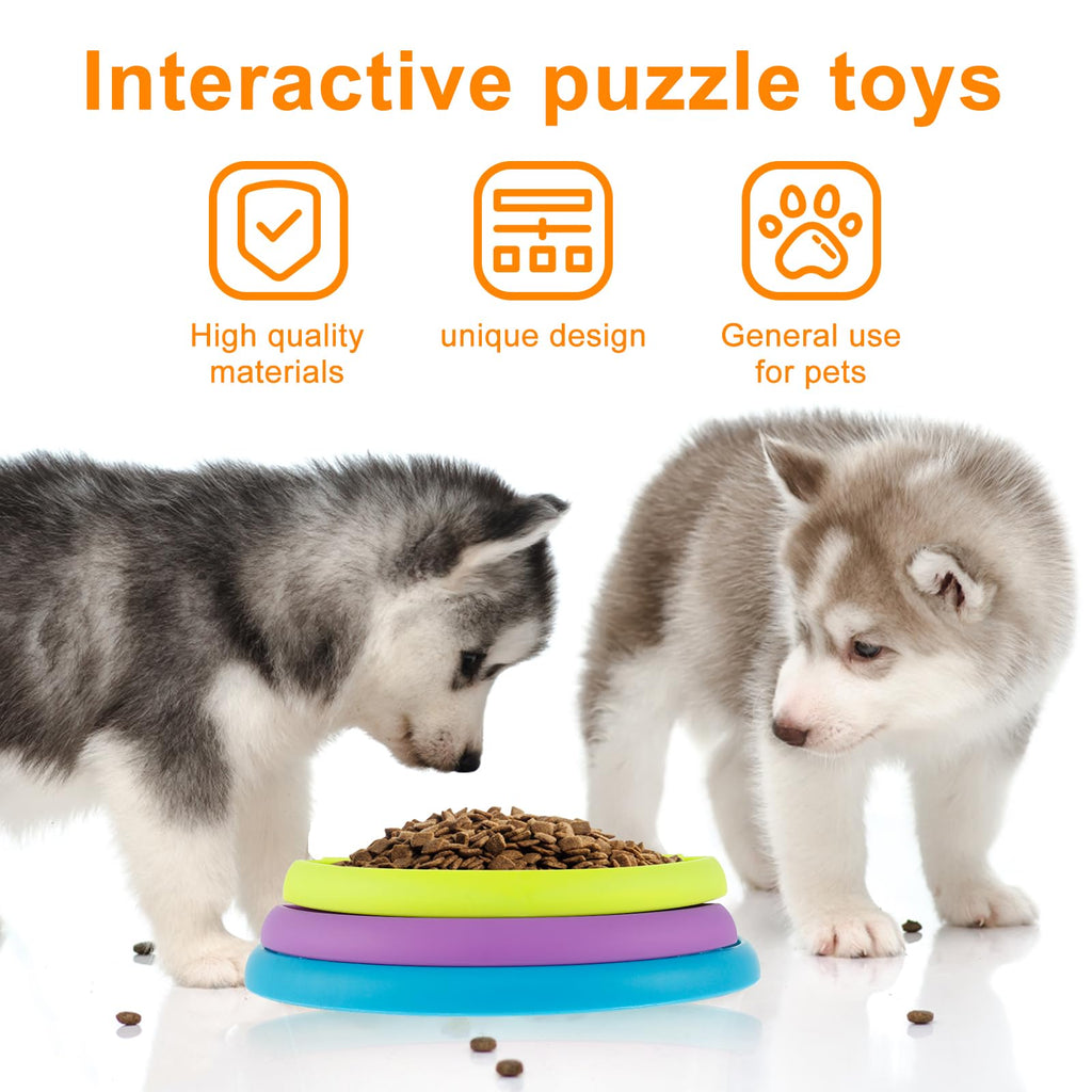 Puppies eating from the puzzle feeder